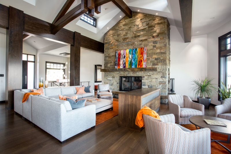 Design ideas for a mid-sized transitional open concept family room in Salt Lake City with white walls, dark hardwood floors, a standard fireplace and a stone fireplace surround.