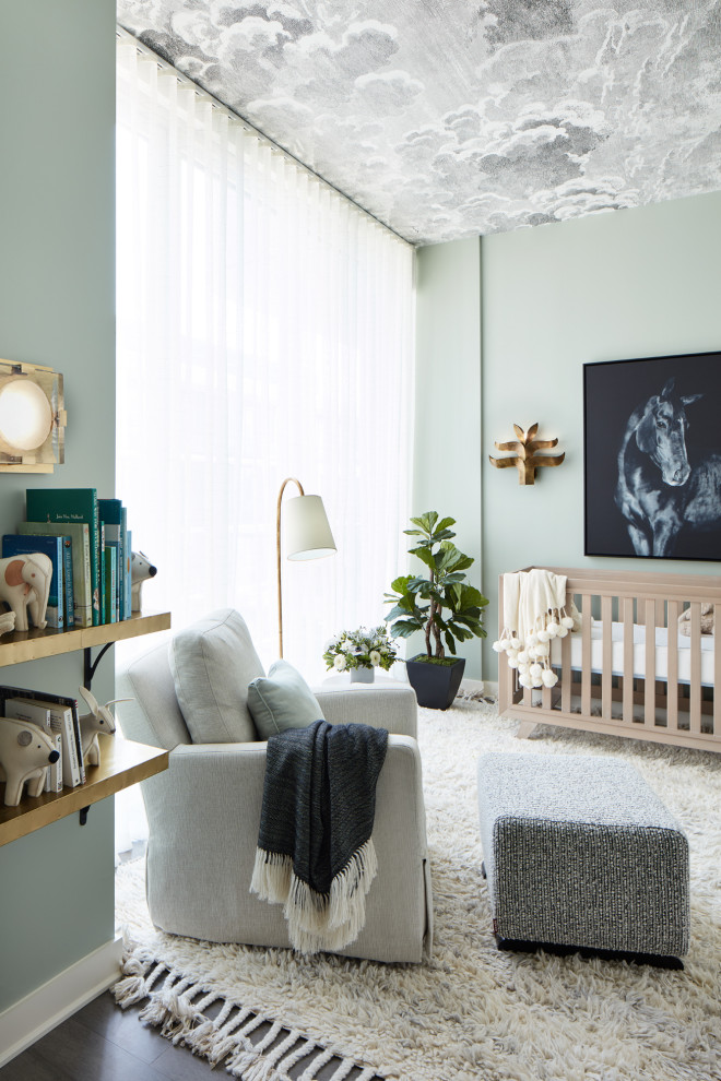 Example of a transitional gender-neutral dark wood floor, brown floor and wallpaper ceiling nursery design in New York with gray walls