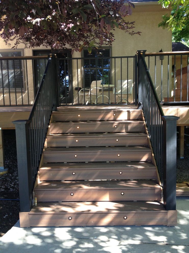 Deck - large transitional backyard deck idea in Denver with no cover