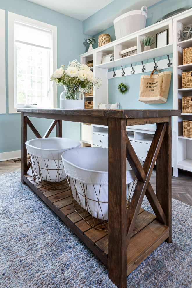 Inspiration for a country laundry room in Cleveland.