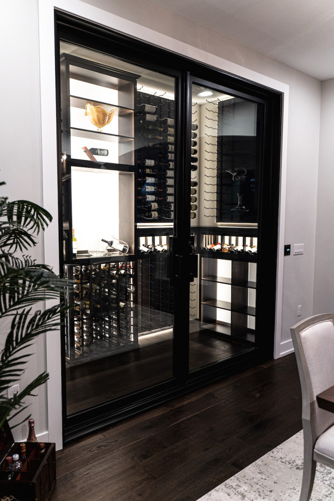 This is an example of a contemporary wine cellar in Orange County.