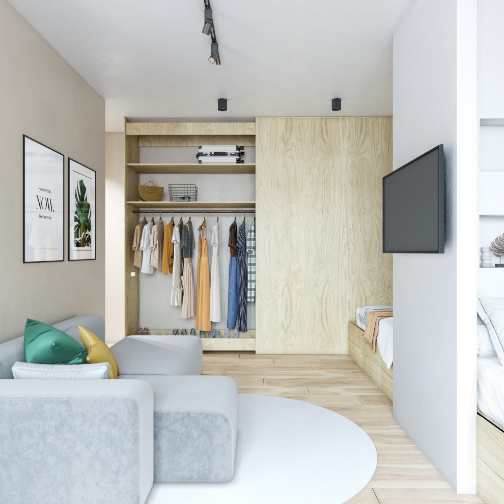 Фишка проекта-огромный шкаф, который не видно в интерьере.