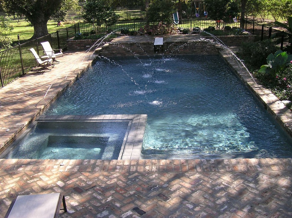 Inspiration for a transitional pool remodel in New Orleans