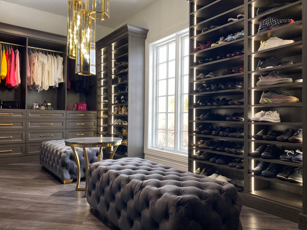 This is an example of a large transitional storage and wardrobe in New York.