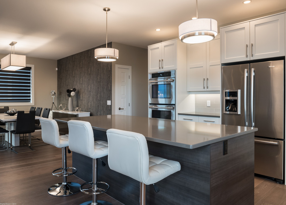 This is an example of a contemporary kitchen in Vancouver with with island.