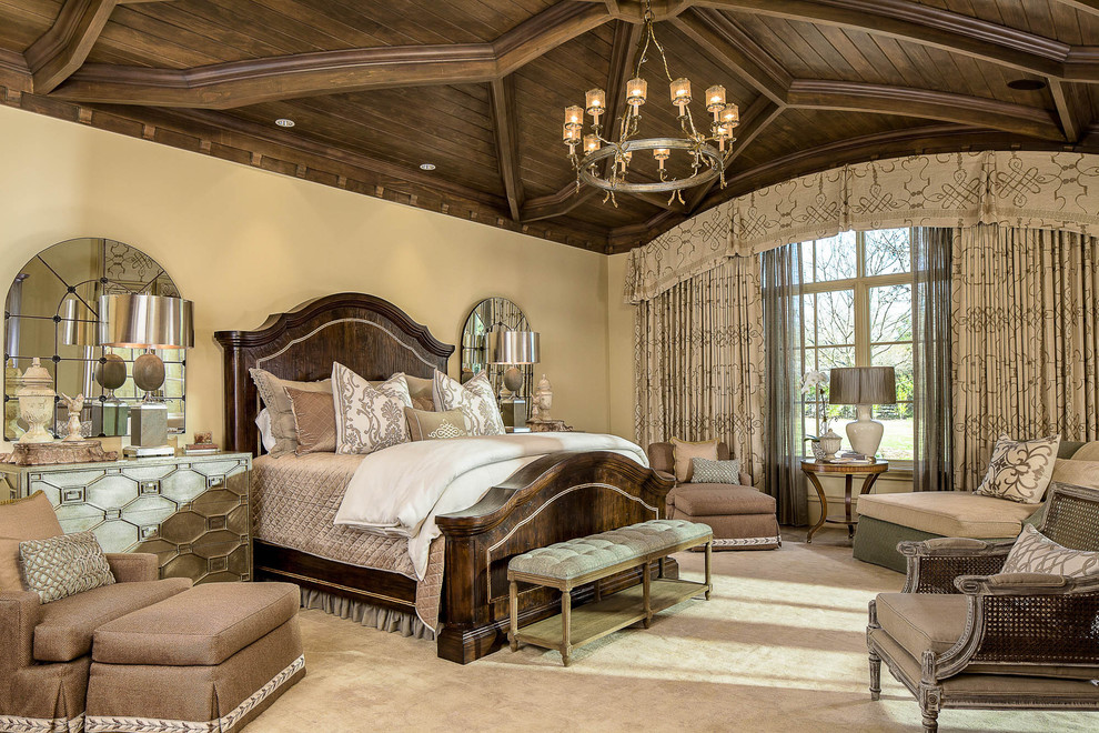 Photo of a traditional bedroom in Dallas with beige walls, carpet and no fireplace.