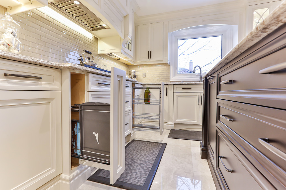 Example of a transitional kitchen design in Toronto