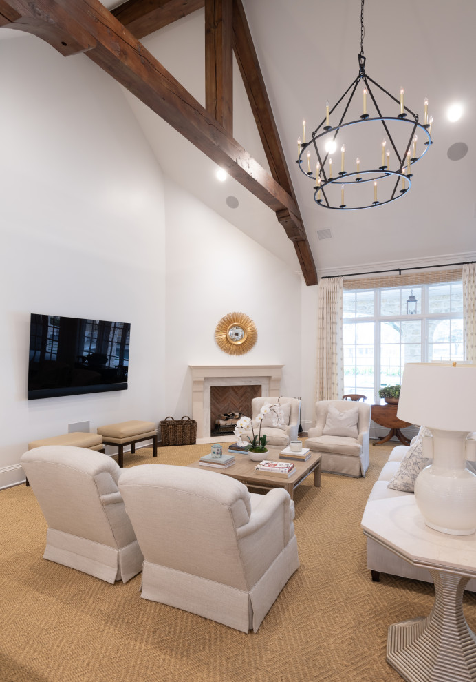 Photo of a large traditional open concept living room in Dallas with white walls, medium hardwood floors, a corner fireplace, a concrete fireplace surround, a wall-mounted tv and exposed beam.