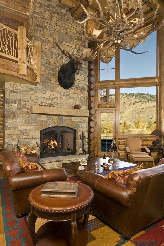 Inspiration for a country living room in Other with a standard fireplace, a stone fireplace surround and no tv.