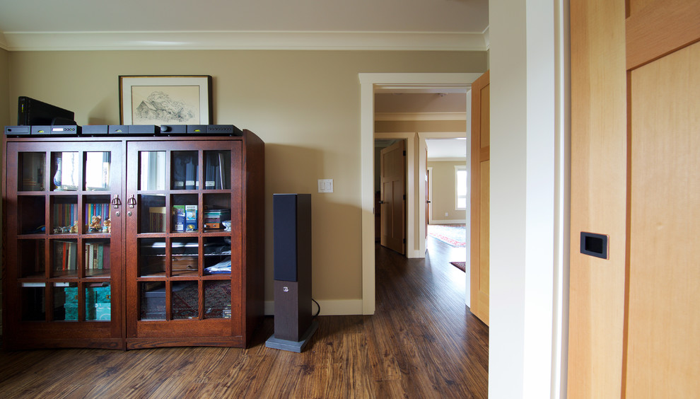 Photo of a traditional enclosed living room in Vancouver with a music area and beige walls.