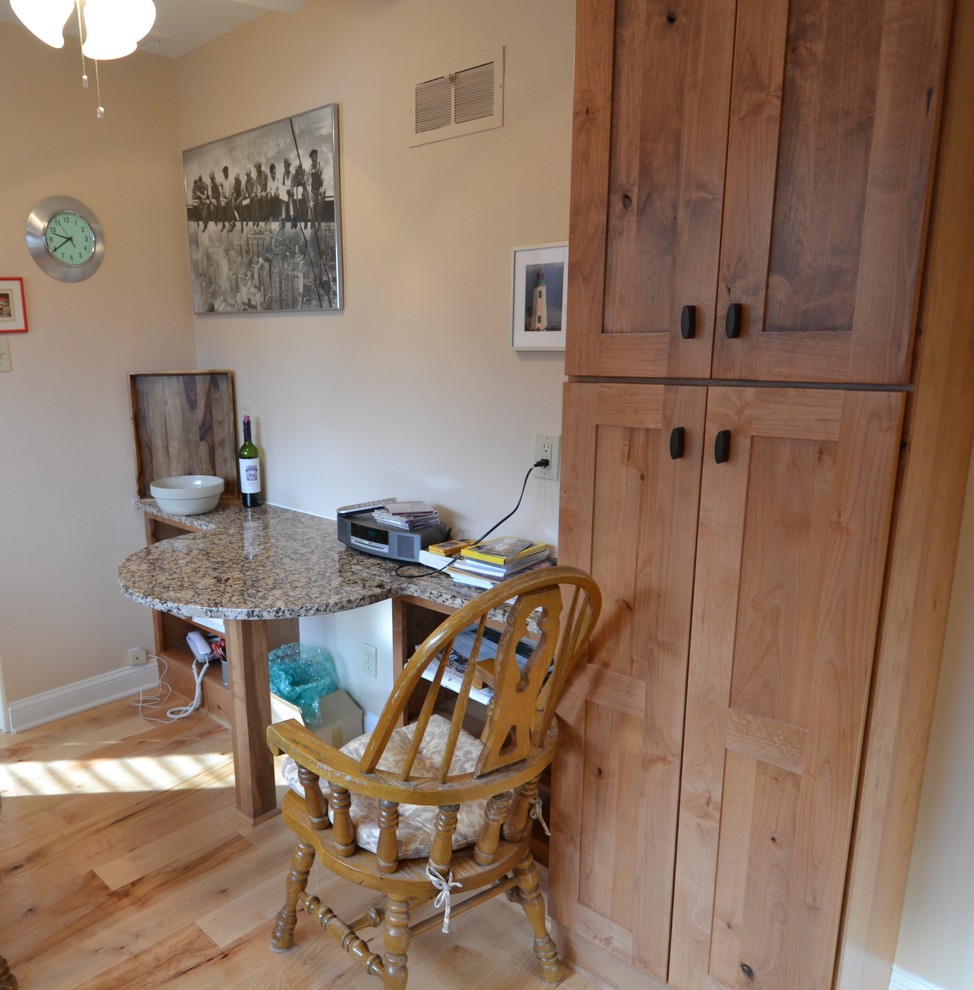 Kitchen with knotty alder cabinets