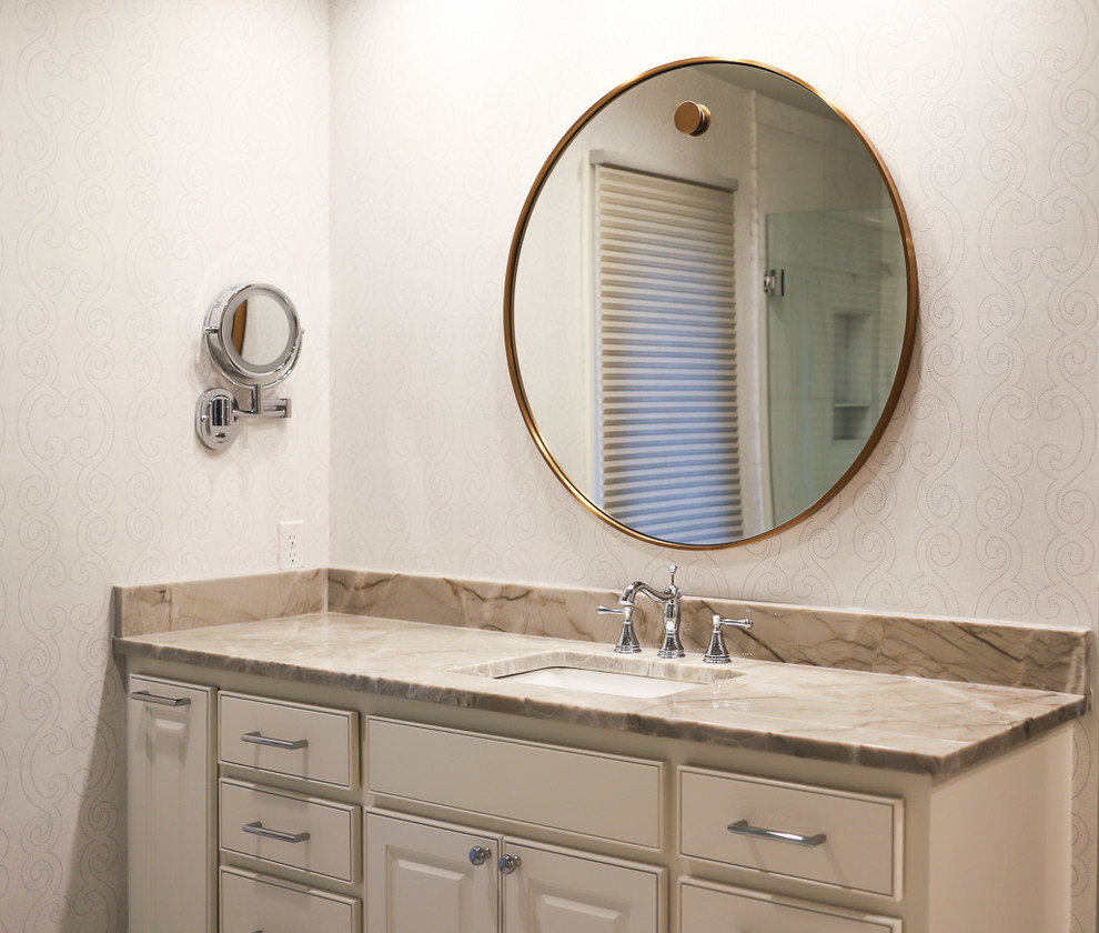 Example of a mid-sized transitional master white tile and marble tile ceramic tile and gray floor alcove bathtub design with gray walls, beaded inset cabinets, white cabinets, a two-piece toilet, an undermount sink, quartzite countertops and a hinged shower door