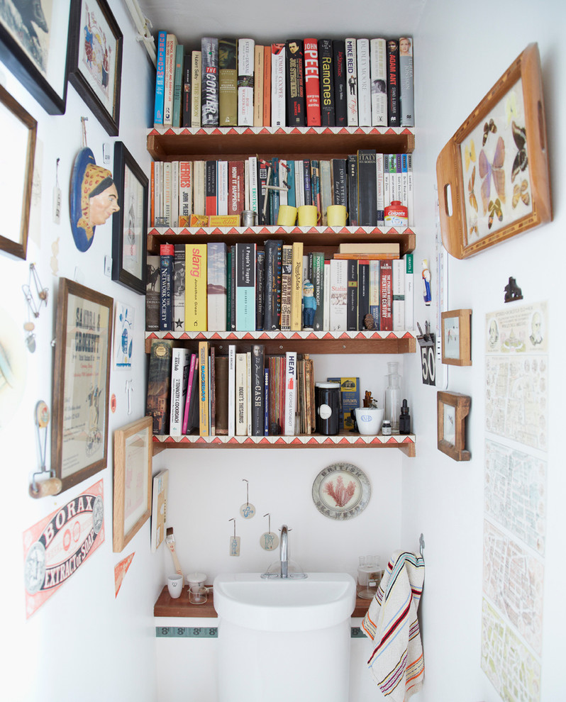 Photo of a small eclectic powder room in London.