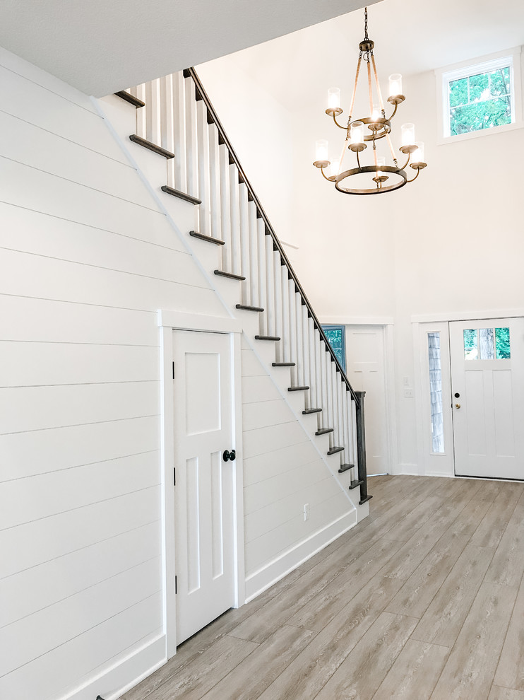 Design ideas for an expansive arts and crafts foyer in Other.