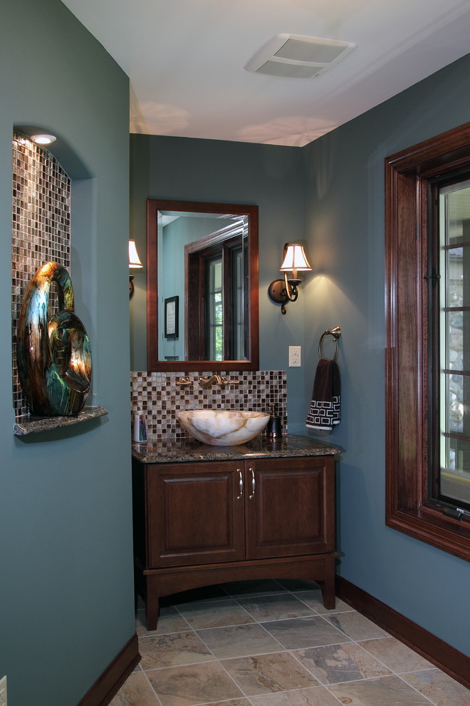 Design ideas for a traditional powder room in Milwaukee with a vessel sink.