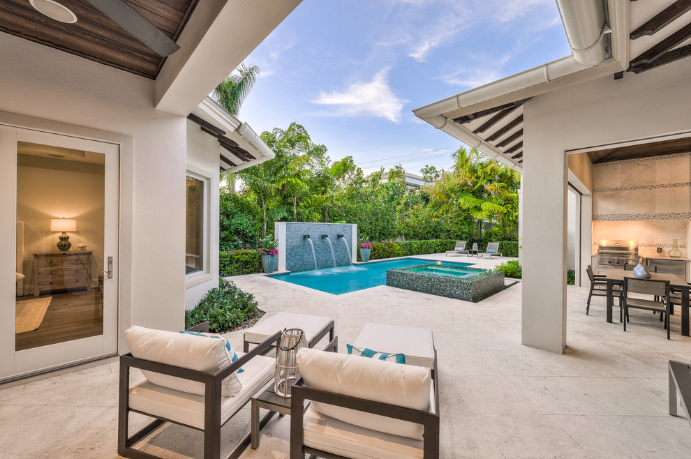Inspiration for a transitional pool remodel in Miami