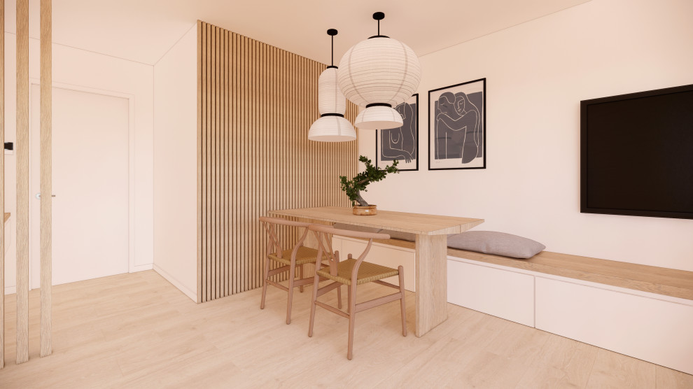 Diseño de comedor actual de tamaño medio abierto con paredes blancas, suelo de madera clara, suelo beige y cuadros