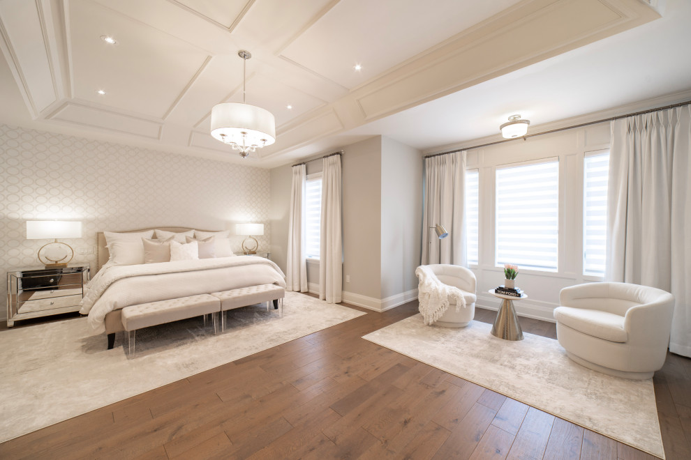 This is an example of a transitional bedroom in Toronto.