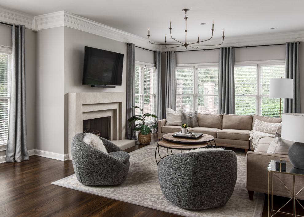Inspiration for a medium sized contemporary open plan living room in Nashville with grey walls, medium hardwood flooring, a standard fireplace, a stone fireplace surround and a wall mounted tv.