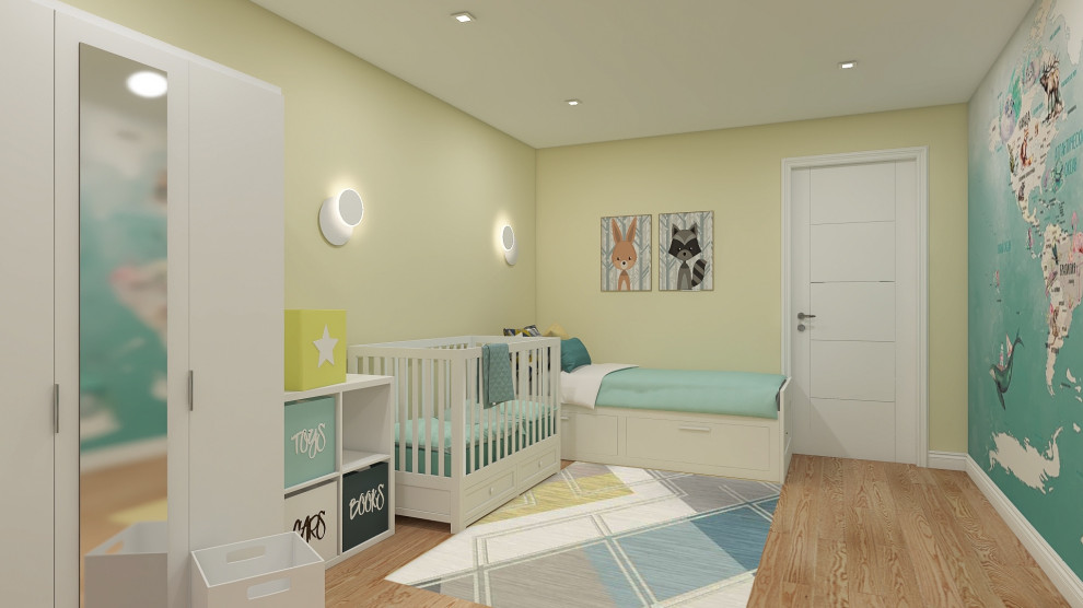 Réalisation d'une chambre d'enfant de 1 à 3 ans design de taille moyenne avec un mur jaune, sol en stratifié, un sol marron et du papier peint.