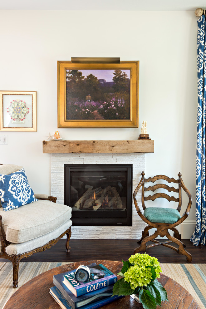 Living room library - mid-sized traditional enclosed vinyl floor living room library idea in Boston with white walls, a standard fireplace, a stone fireplace and no tv