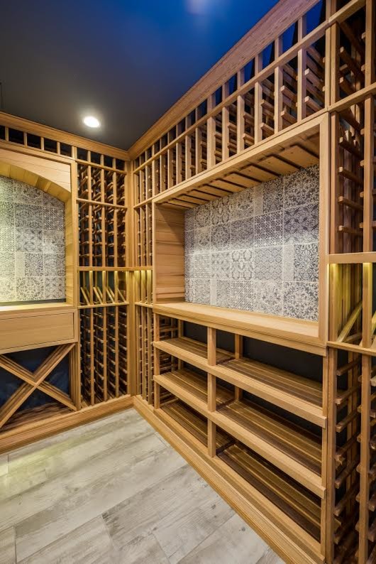 Inspiration for a large mediterranean wine cellar in Other.