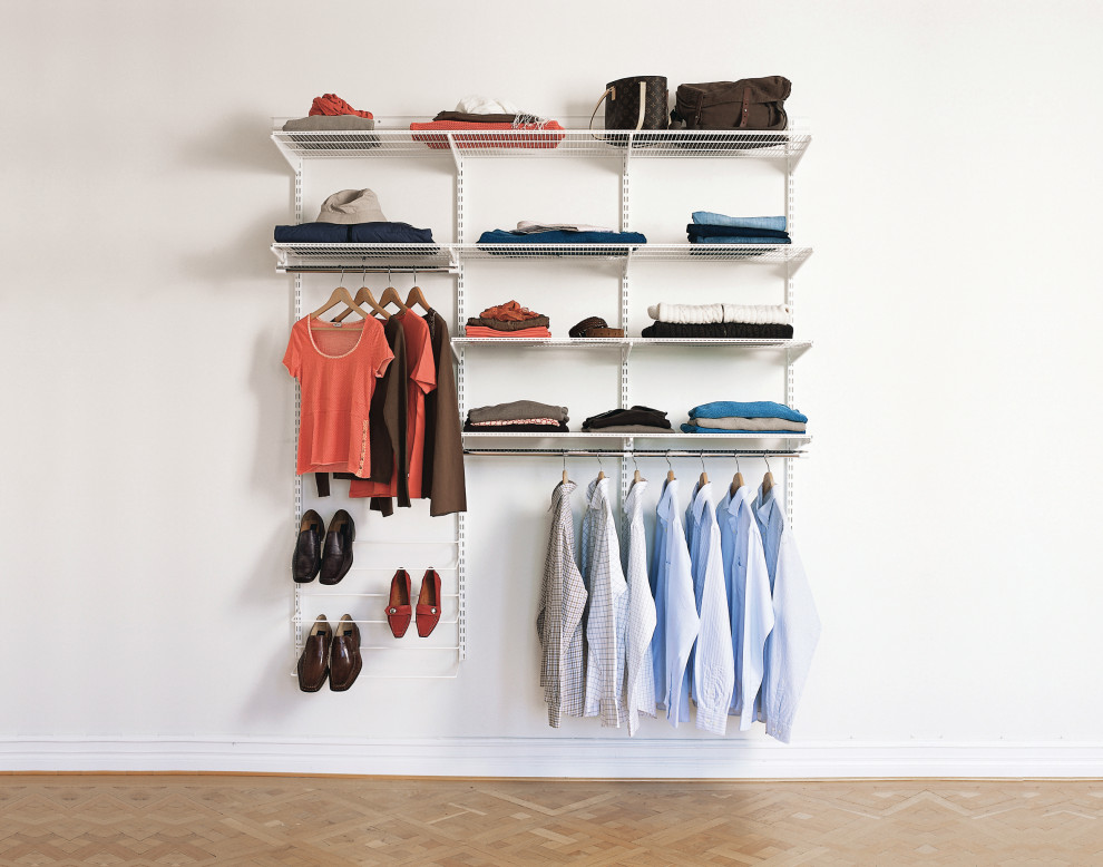 This is an example of a mid-sized scandinavian gender-neutral walk-in wardrobe in Other with open cabinets, white cabinets, medium hardwood floors, brown floor and wallpaper.