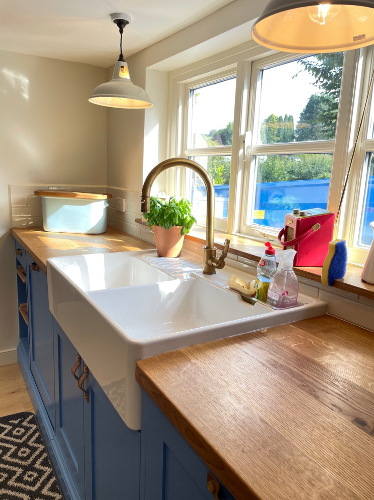 brass tap and butler sink