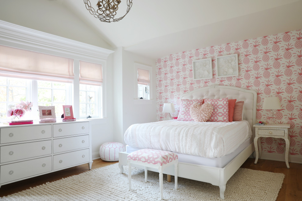 Photo of a mid-sized transitional kids' bedroom for kids 4-10 years old and girls with white walls, light hardwood floors, brown floor, timber and wallpaper.