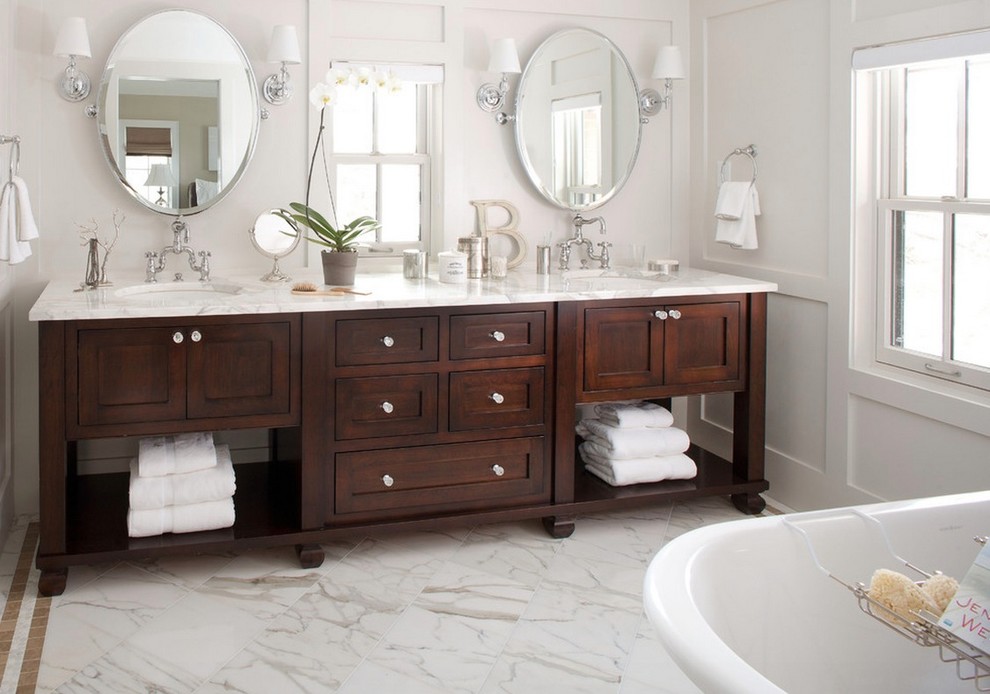 Design ideas for a mid-sized contemporary master bathroom in Los Angeles with an undermount sink, dark wood cabinets, white walls, marble floors, white floor, a freestanding tub, marble benchtops and shaker cabinets.