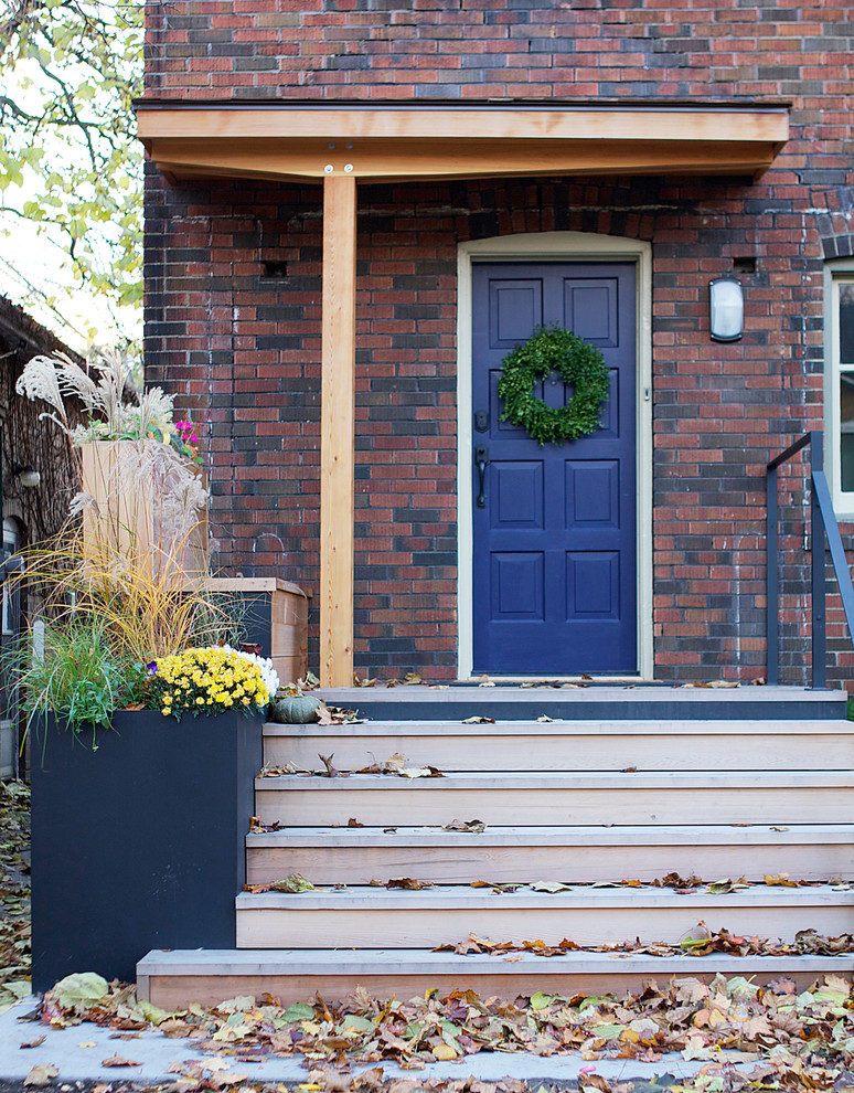 Design ideas for a contemporary front door in Toronto with a single front door and a blue front door.