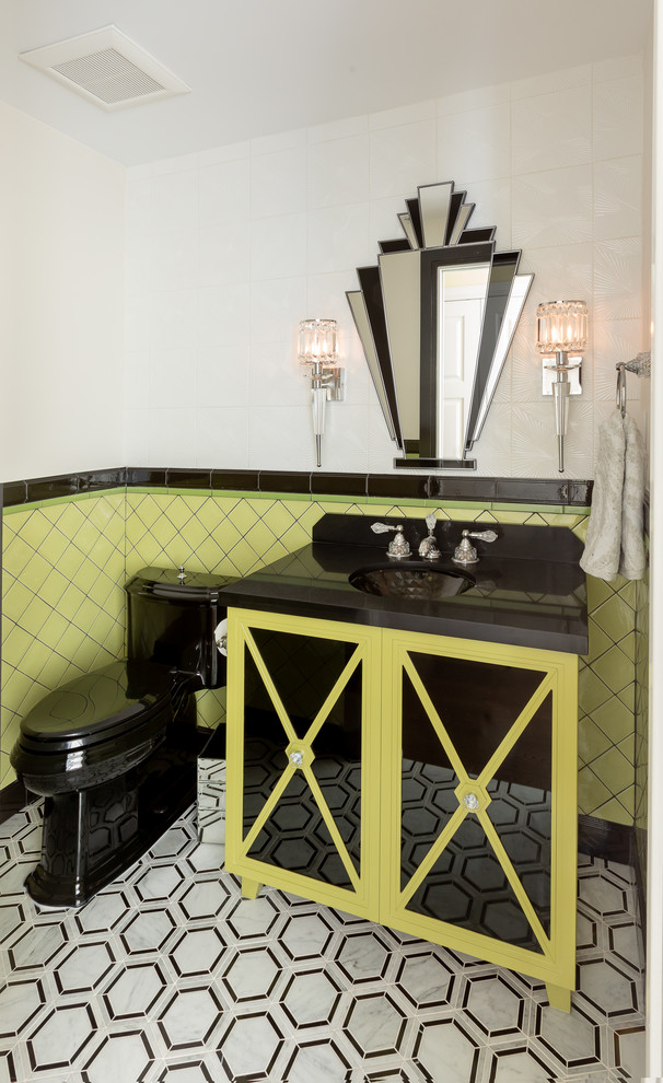 Inspiration for a small transitional powder room in Vancouver with glass-front cabinets, green cabinets, green tile, black tile, multi-coloured tile, ceramic tile, white walls, engineered quartz benchtops, multi-coloured floor, black benchtops and an integrated sink.