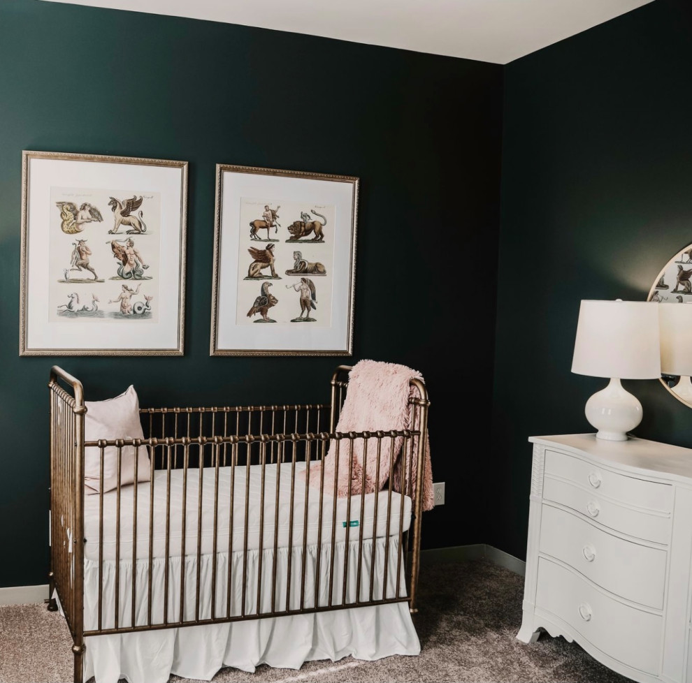 Photo of a mid-sized contemporary nursery for girls in Louisville with green walls and carpet.