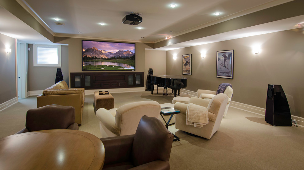 Inspiration for a large transitional open concept home theatre in Detroit with beige walls, carpet, a projector screen and beige floor.