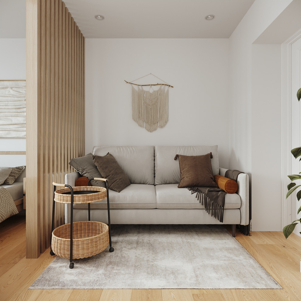 Inspiration för vardagsrum, med beige väggar, laminatgolv, en väggmonterad TV och flerfärgat golv