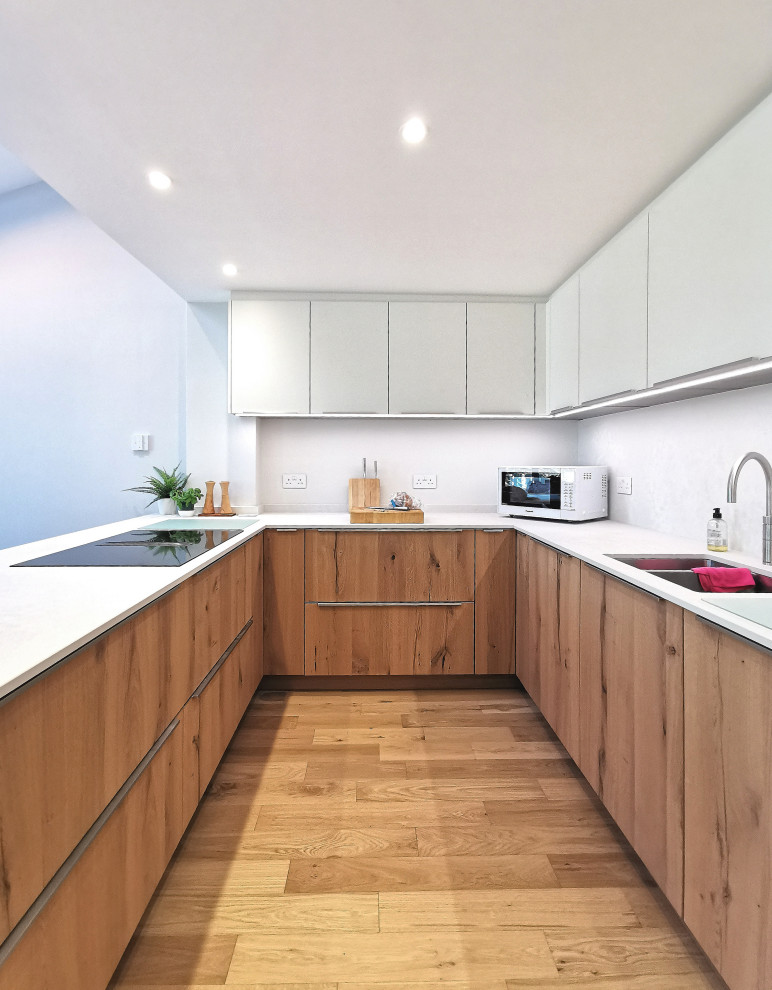 This is an example of a scandinavian kitchen in Hertfordshire.