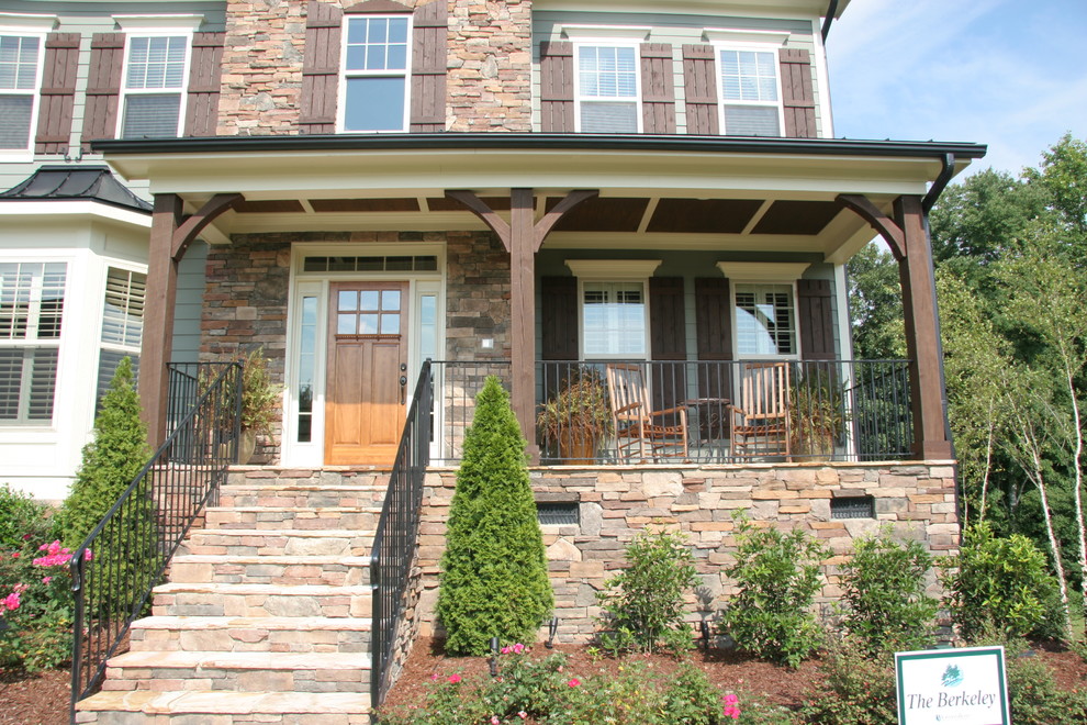 Example of a mountain style home design design in Raleigh