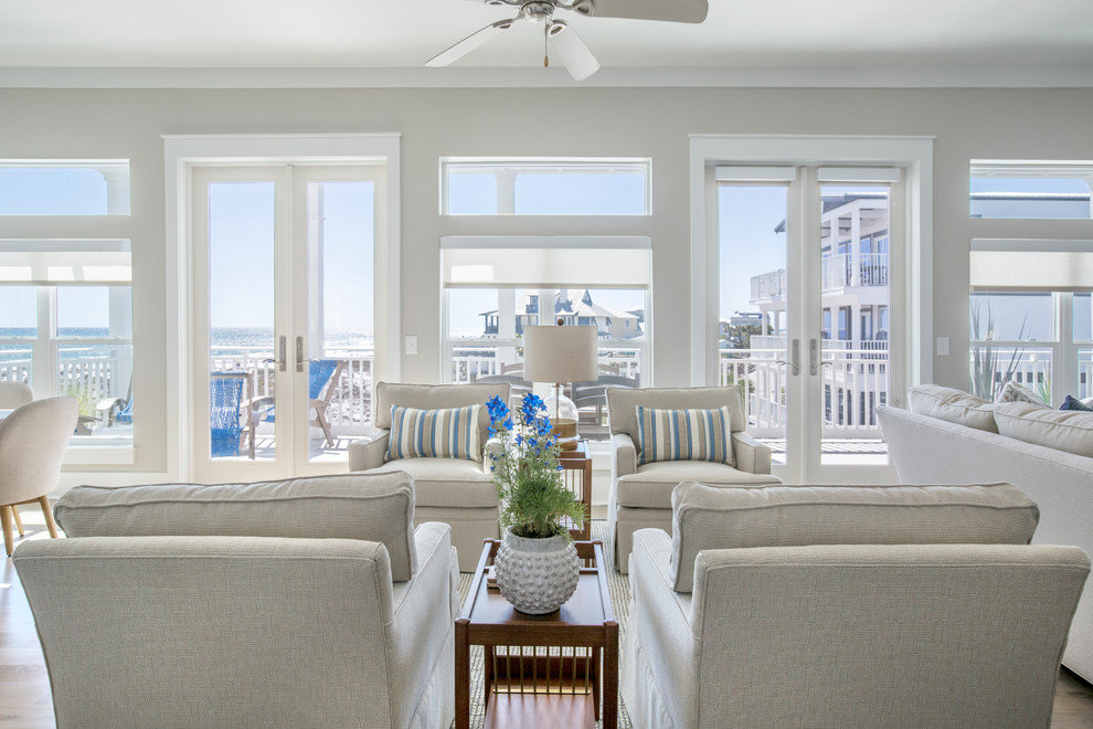 Design ideas for a beach style family room in Miami.