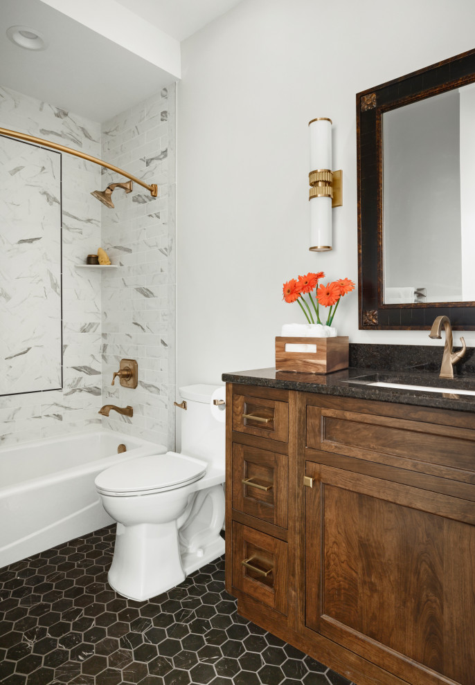 Design ideas for a transitional bathroom in Minneapolis with recessed-panel cabinets, dark wood cabinets, a shower/bathtub combo, grey walls, porcelain floors, an undermount sink, quartzite benchtops, black floor, a shower curtain, black benchtops, a single vanity and a built-in vanity.