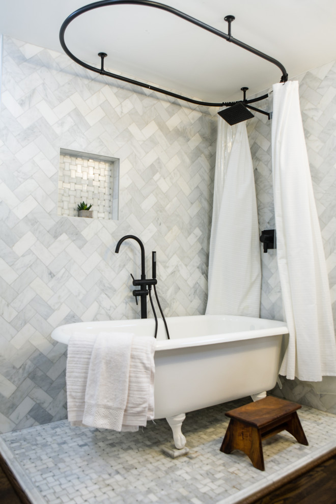 Inspiration for a small country master bathroom in Columbus with a claw-foot tub, a shower/bathtub combo, gray tile, marble, marble floors, a shower curtain, a niche, a single vanity and a freestanding vanity.