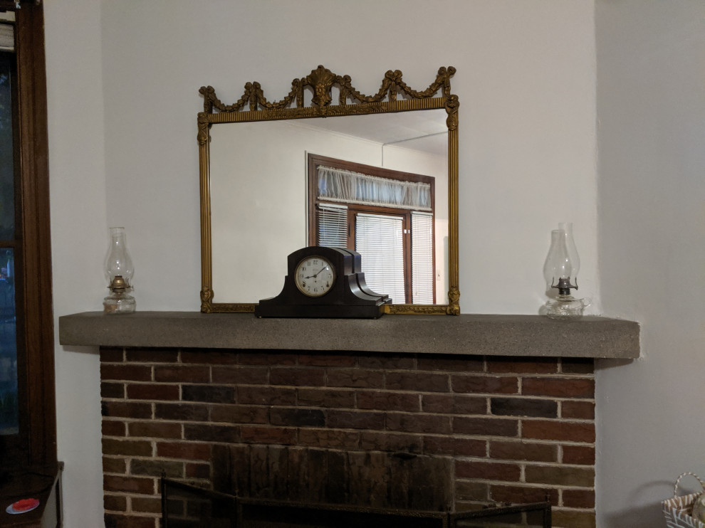 Hanging heavy mirror over fireplace with no studs