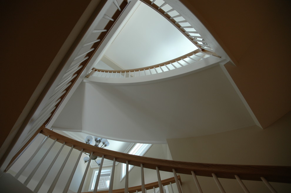Inspiration for a mid-sized transitional staircase remodel in Chicago