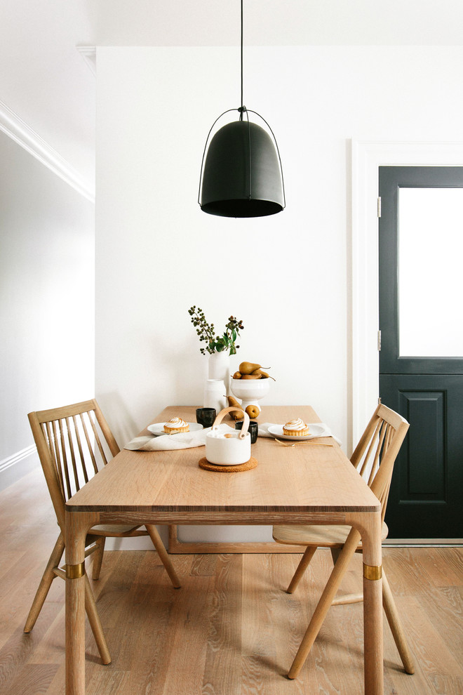 Kitchen/dining room combo - small scandinavian kitchen/dining room combo idea in Other with white walls