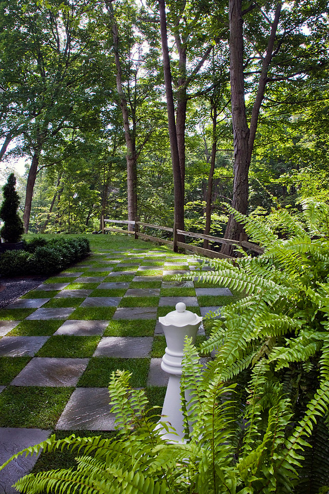 Photo of a traditional backyard shaded outdoor sport court in Chicago.