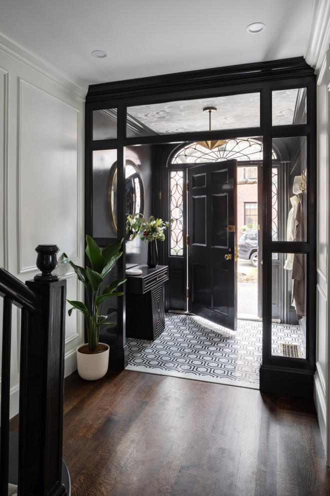 Foyer - mid-sized transitional porcelain tile, white floor, wallpaper ceiling and wainscoting foyer idea in Boston with black walls and a black front door