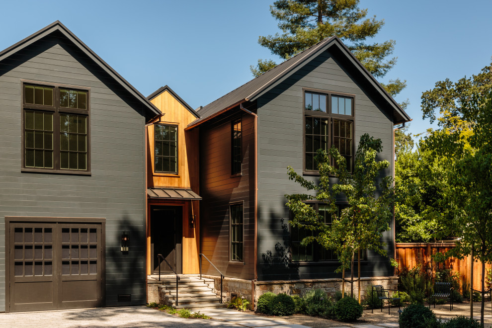 Ross Custom Home - Thoughtful design and detailed craft combine to create this timelessly elegant custom home. The contemporary vocabulary and classic gabled roof harmonize with the surrounding neighborhood and natural landscape. Built from the ground up, a two story structure in the front contains the private quarters, while the one story extension in the rear houses the Great Room - kitchen, dining and living - with vaulted ceilings and ample natural light. Large sliding doors open from the Great Room onto a south-facing patio and lawn creating an inviting indoor/outdoor space for family and friends to gather.

Chambers + Chambers Architects
Stone Interiors
Federika Moller Landscape Architecture
Alanna Hale Photography