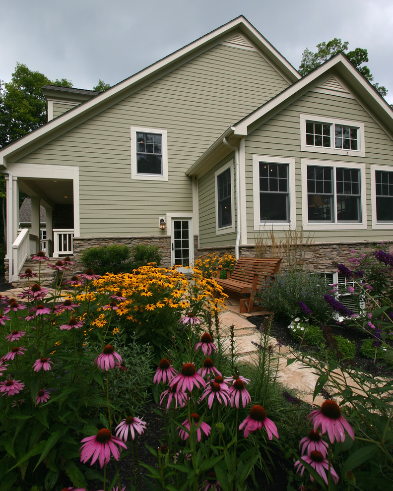 Traditional exterior in Columbus with wood siding.