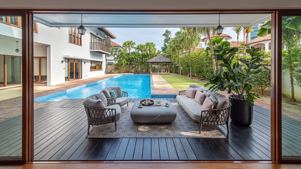 Inspiration for a modern pool in Singapore.