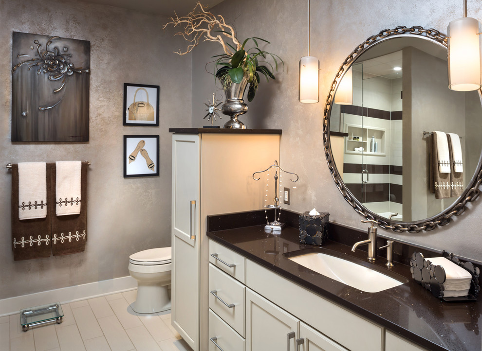 Mid-sized contemporary master bathroom in Milwaukee with flat-panel cabinets, white cabinets, granite benchtops, beige tile and stone tile.