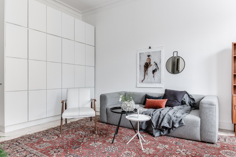 Inspiration för mellanstora skandinaviska allrum med öppen planlösning, med vita väggar